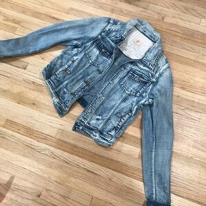 Distressed denim jacket